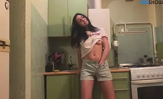 Brunette Unveils Sensual Seduction in the Kitchen